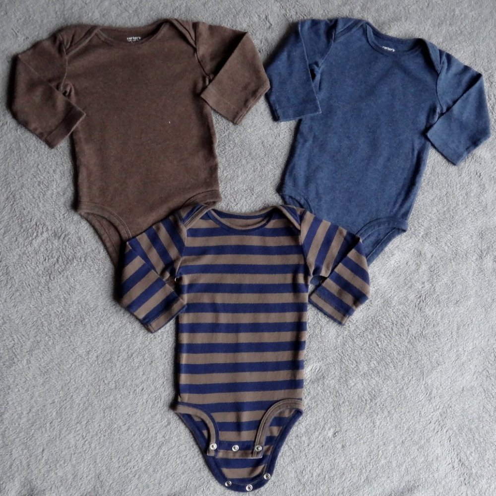 three Carter's baby long sleeve bodysuits